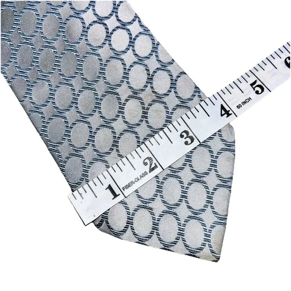 Gucci Italian Silk Tie Jacquard O’s Pattern All Over Print GG Interlocking  Logo